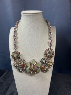 Talbots bib necklace featuring multi-colored crystals and a pink ribbon chain
